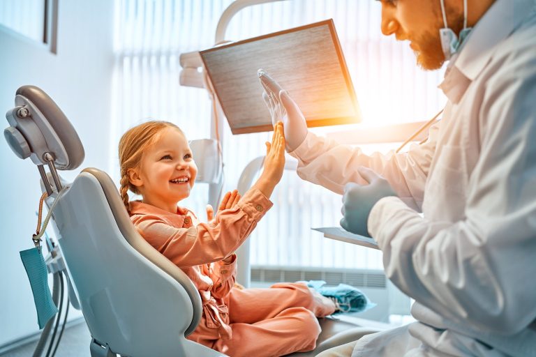 Child at dentist getting a filling
