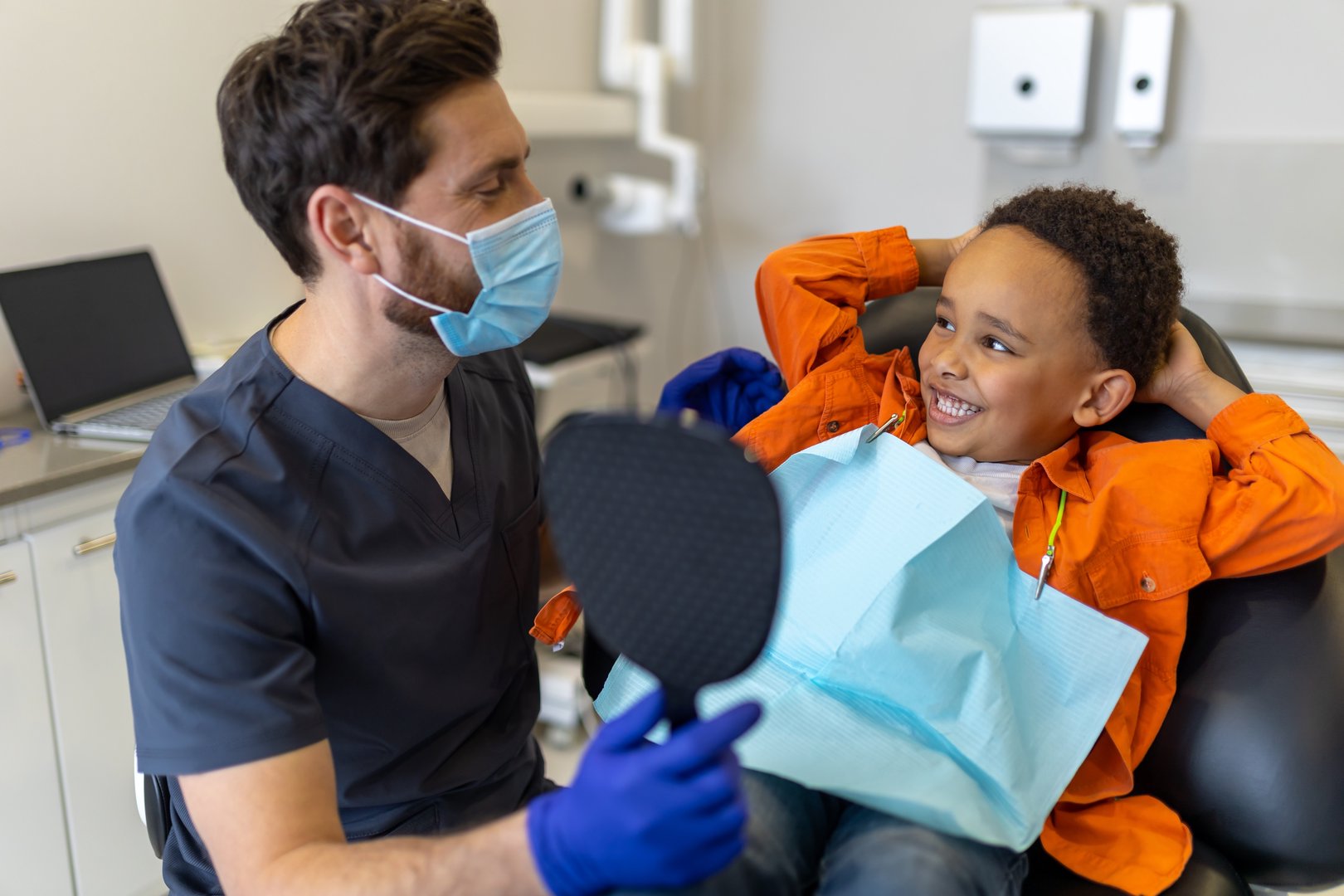 Happy child smiling at dentist appointment