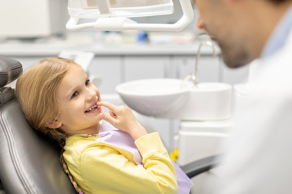 Childrens Dentist with dental crown