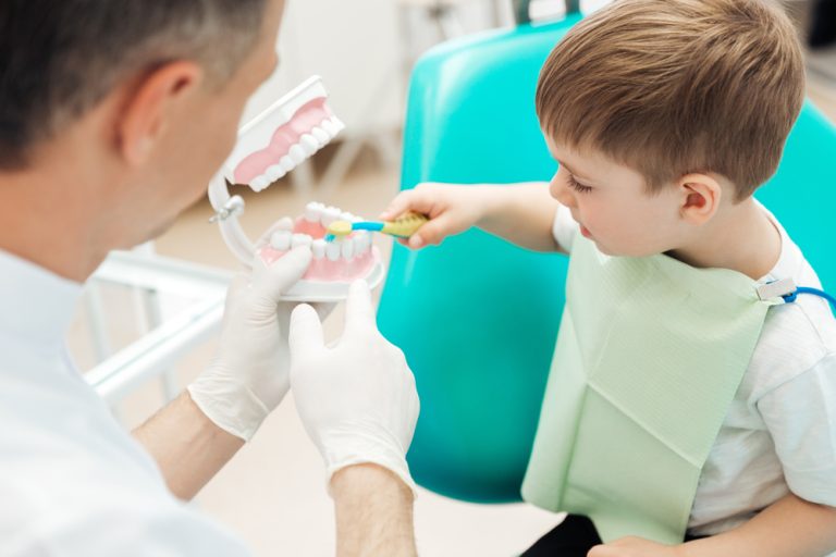 Parent and child at childrens dentist office